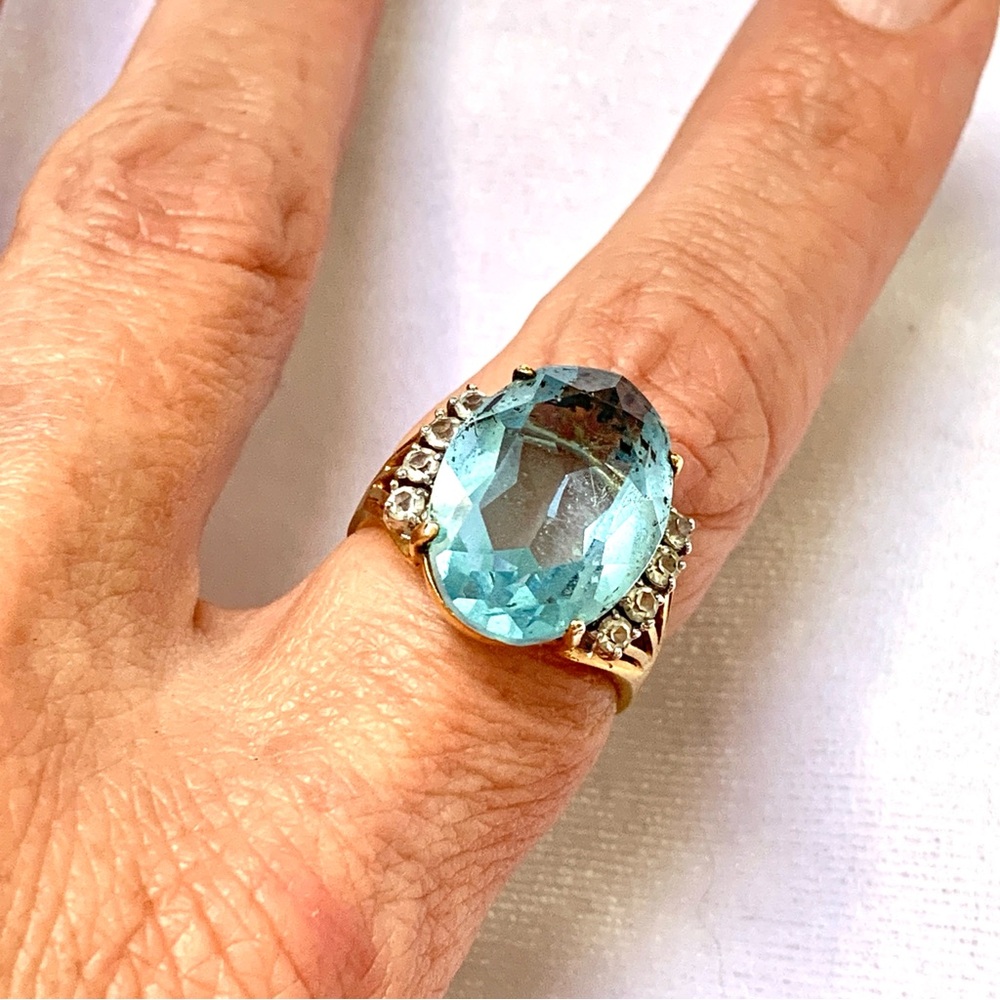 Large Pale Blue Glass Cocktail Ring Gold tone setting Clear Rhinestone Accents